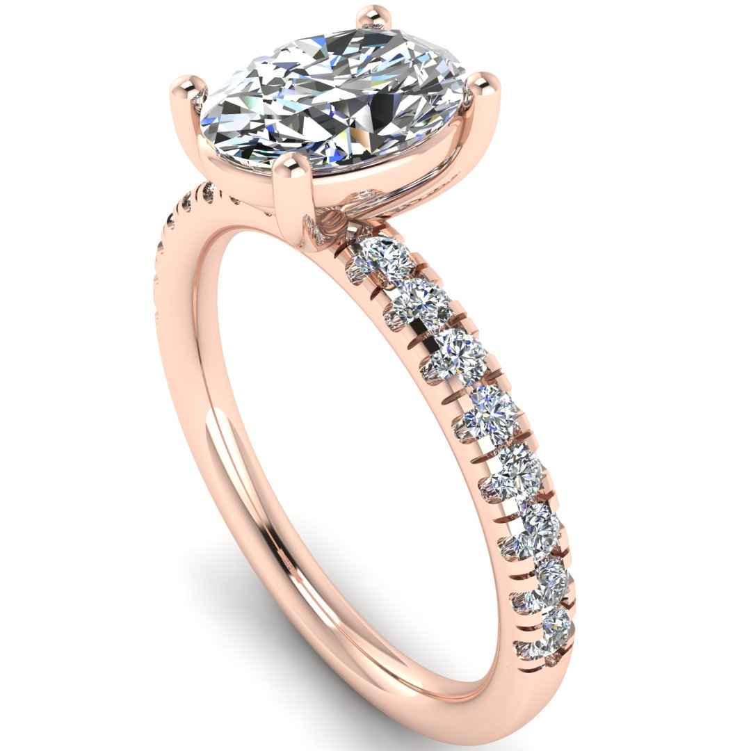 Rose gold ring with a large central diamond and smaller stones on the band against a white background