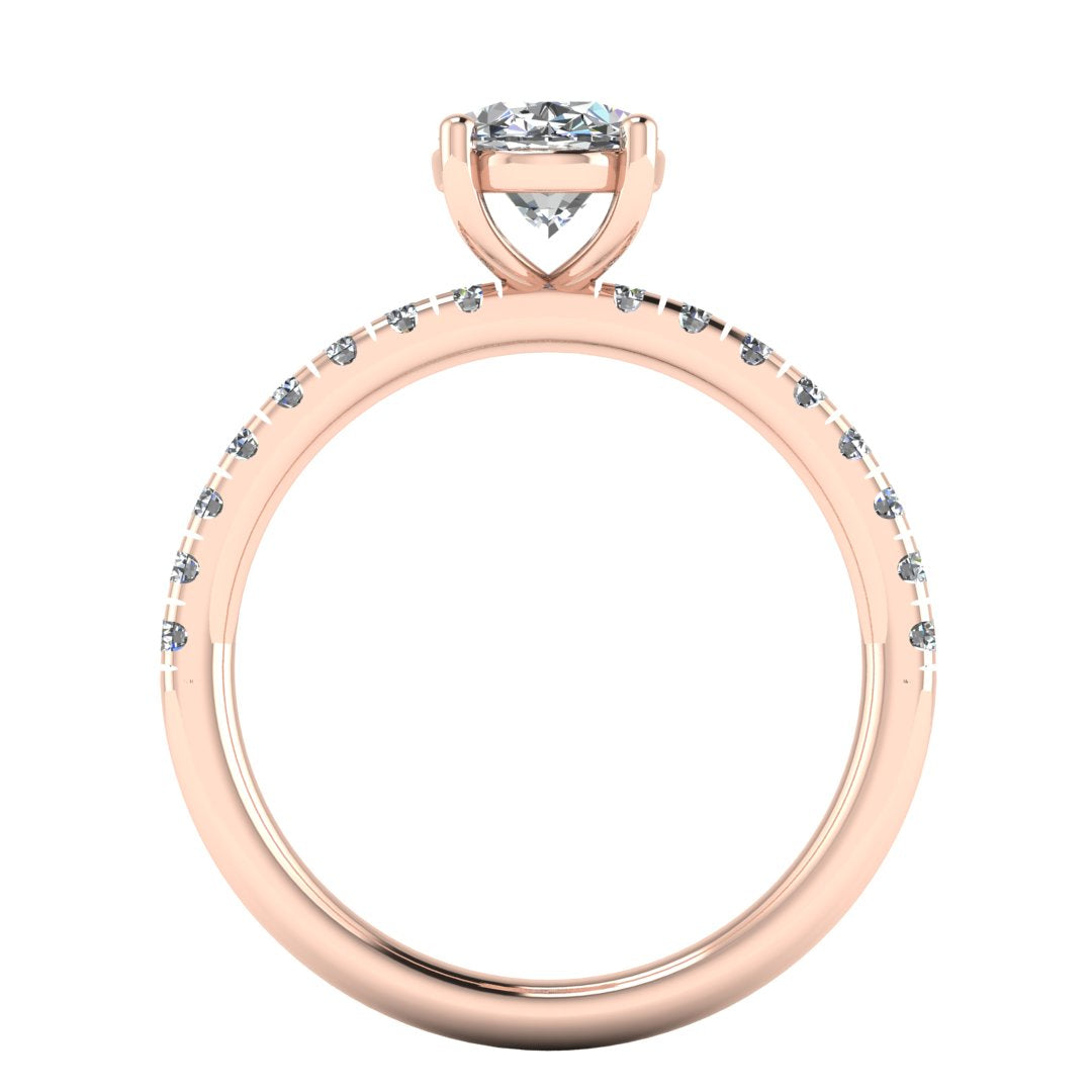 Rose gold ring with a diamond on a white background