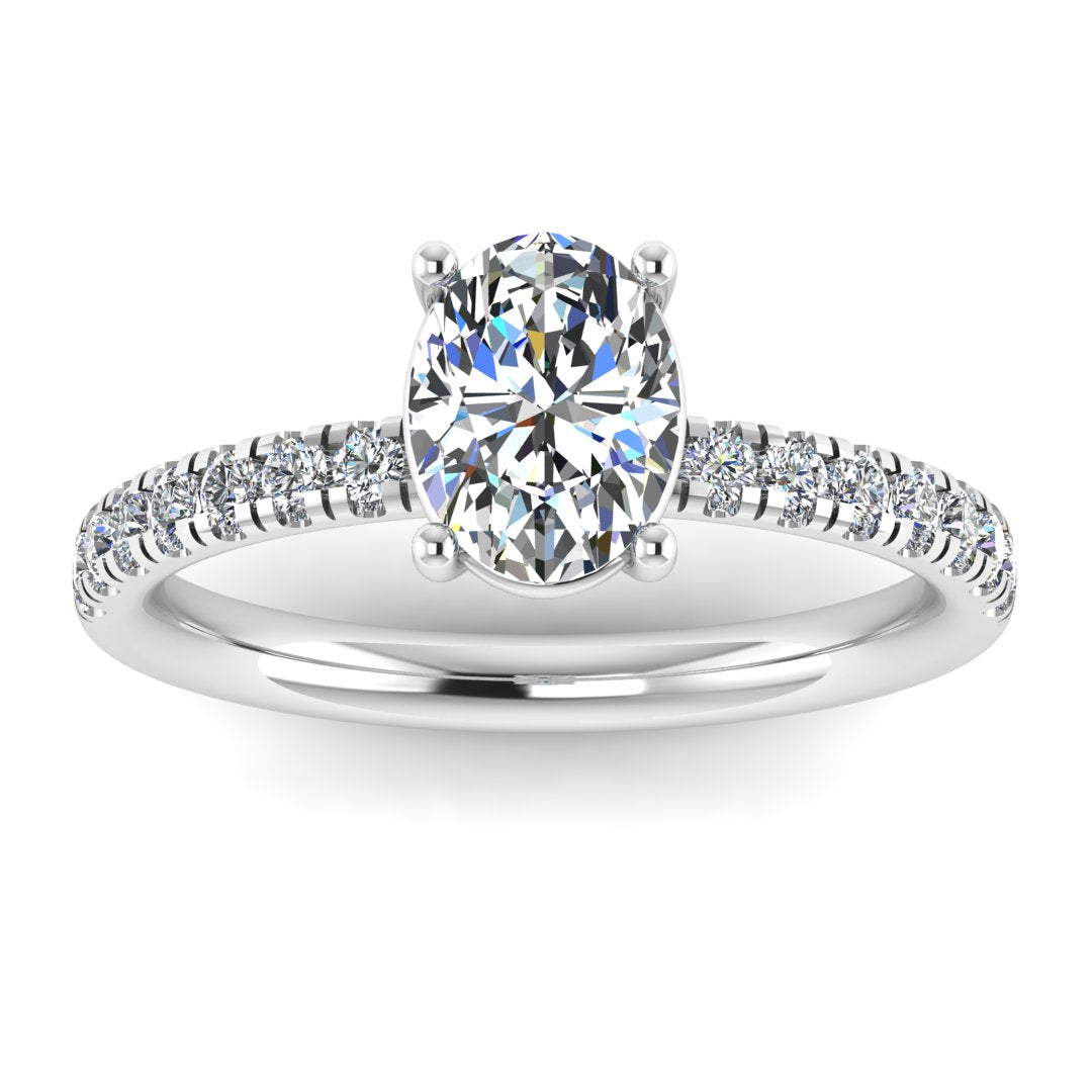 Front view of white gold and platinum engagement ring with oval cut lab grown diamond set on a pave band with side shoulder stones
