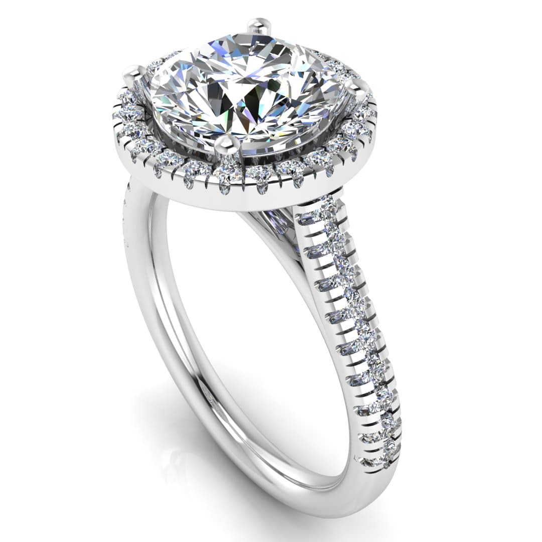 Angled view of Holly white gold and platinum lab grown diamond engagement ring with halo and side shoulder diamonds