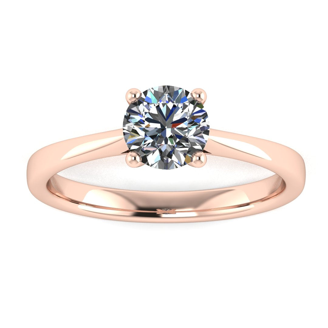 Front view of the Arya Engagement ring in rose gold. A traditional single solitaire round brilliant lab grown diamond in a cathedral setting