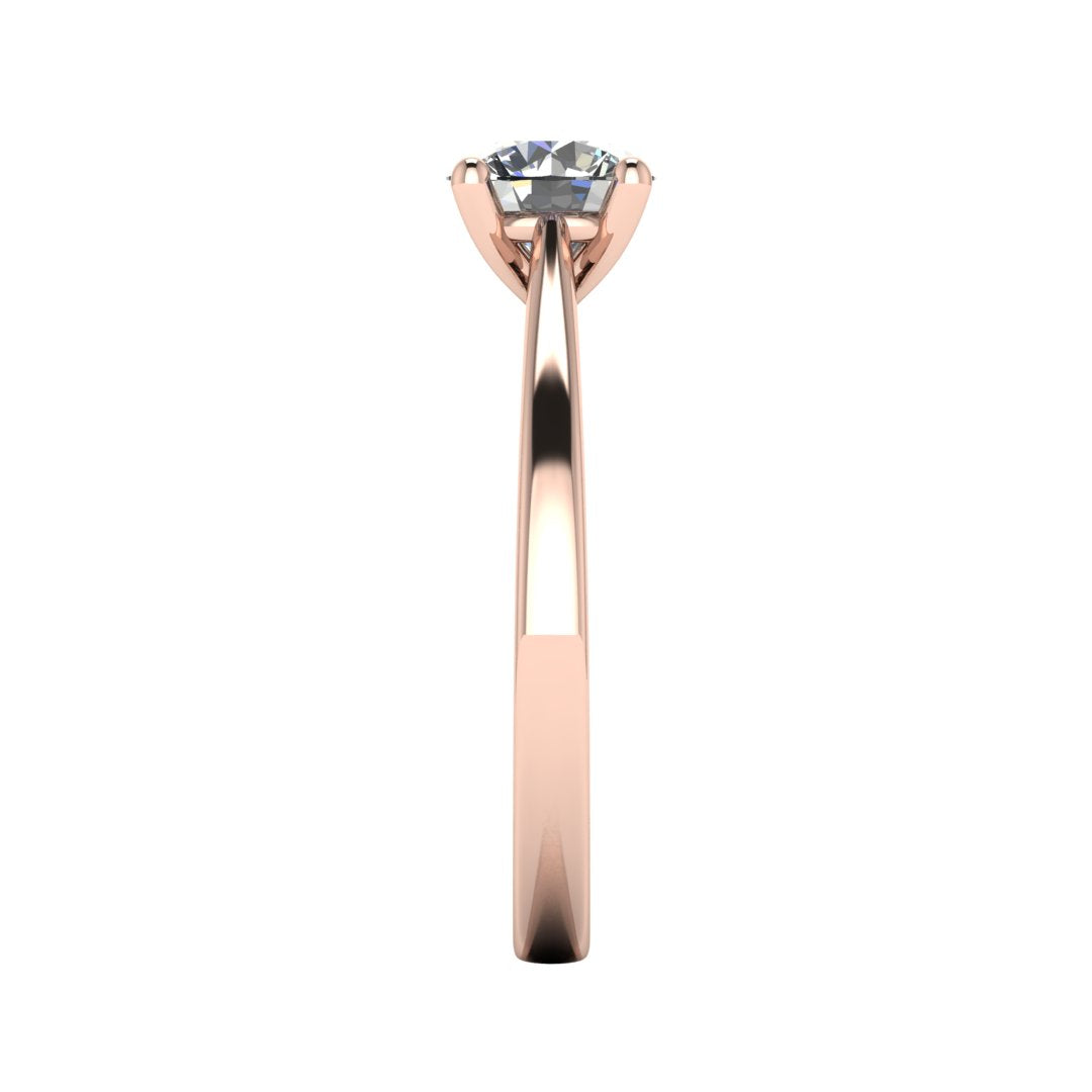 Side view of the Arya Engagement ring in rose gold. A traditional single solitaire round brilliant lab grown diamond in a cathedral setting