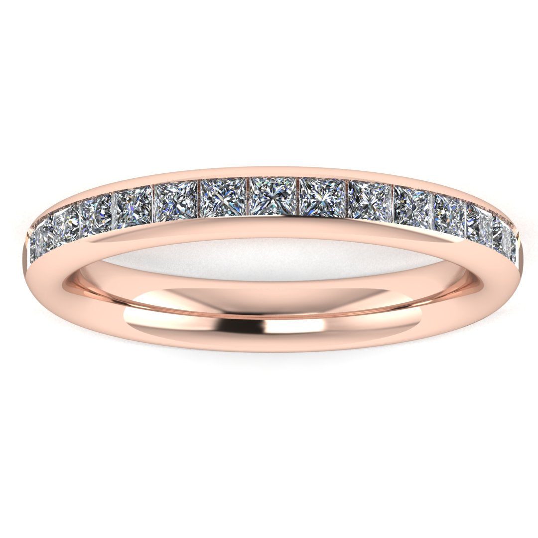front view of a rose gold lab grown diamond channel set wedding band with princess cut lab grown diamonds