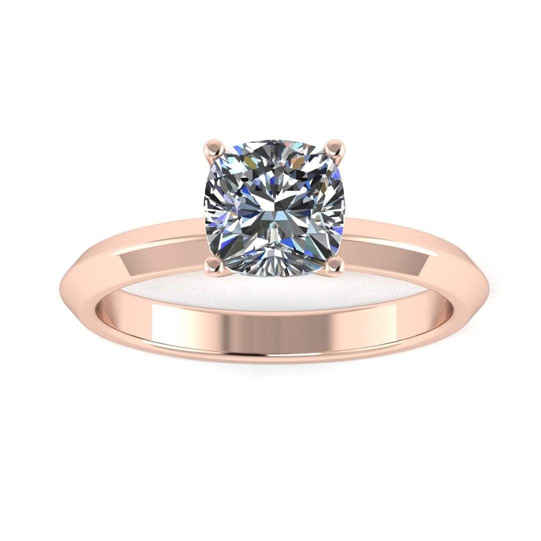 front view of rose gold engagement ring featuring a cushion cut lab grown diamond in a floating setting with 4 claws