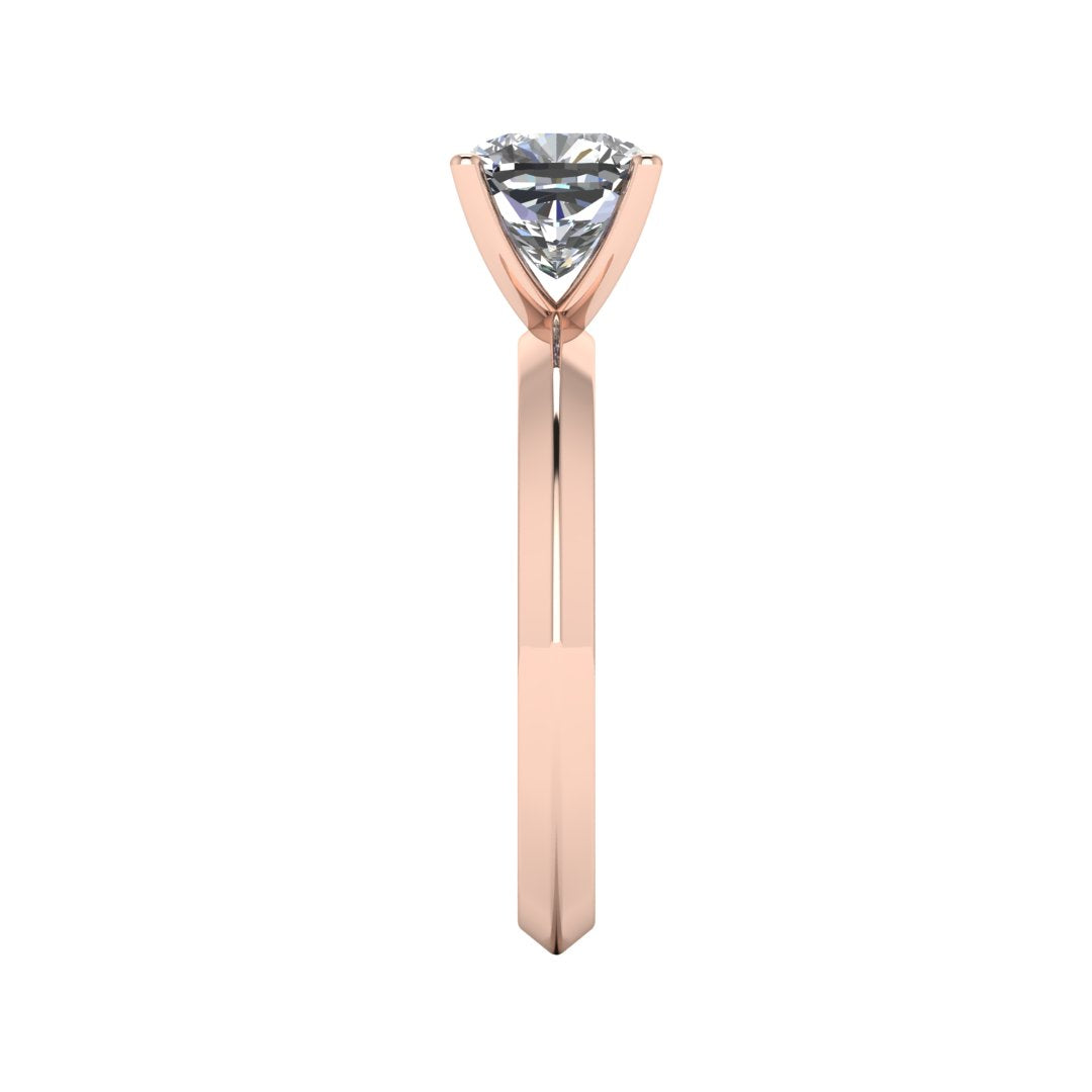 side view of rose gold engagement ring featuring a cushion cut lab grown diamond in a floating setting with 4 claws