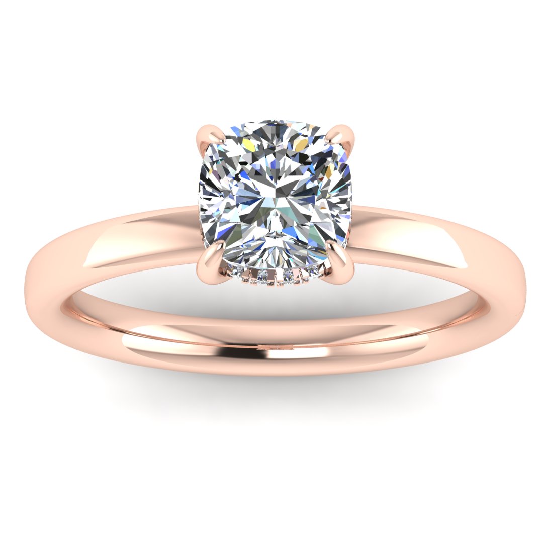 front view of a rose gold engagement ring featuring a cushion cut lab grown diamond with a hidden halo in a solitaire design