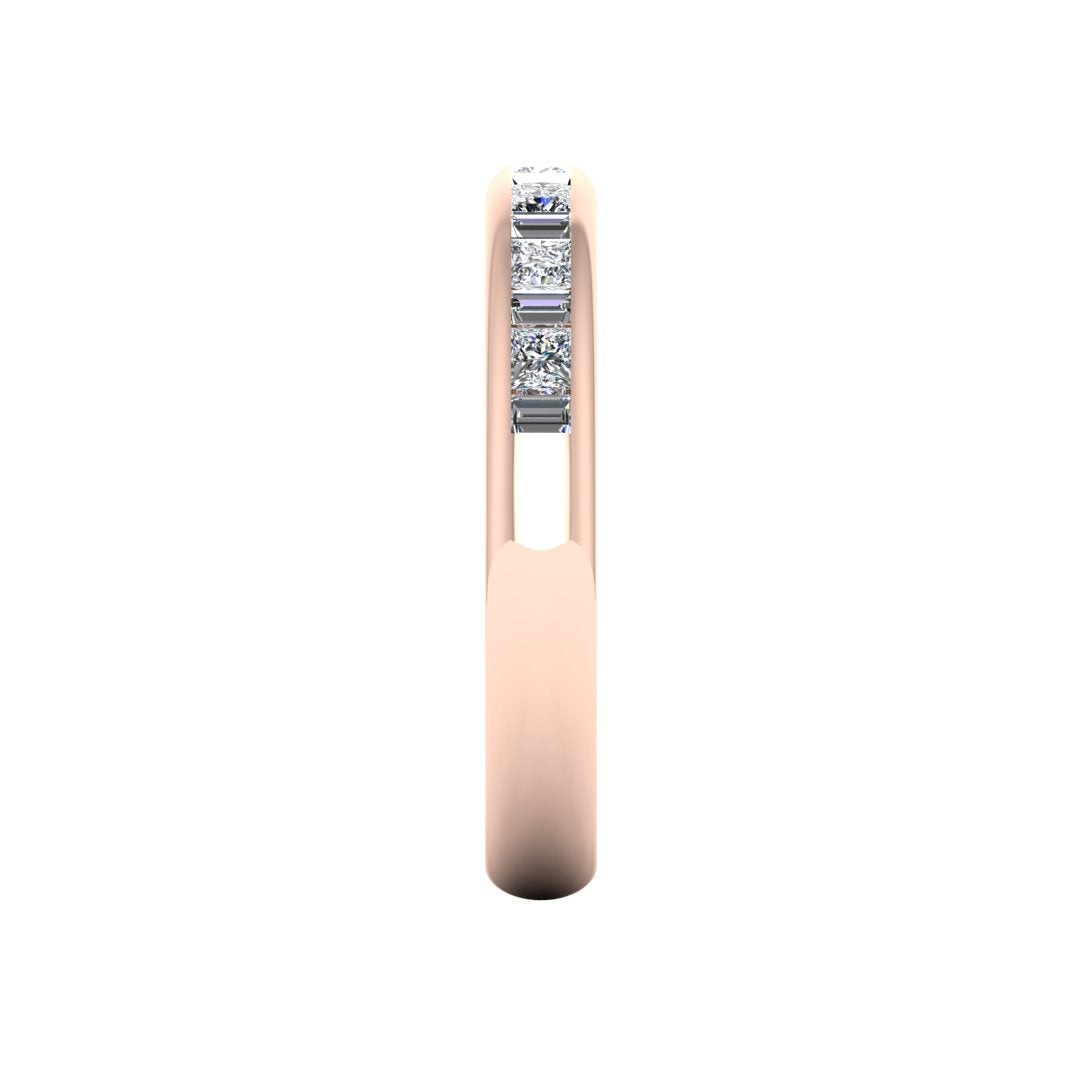 side view of a rose gold wedding band with princess and baguette lab-grown diamond in a channel set design