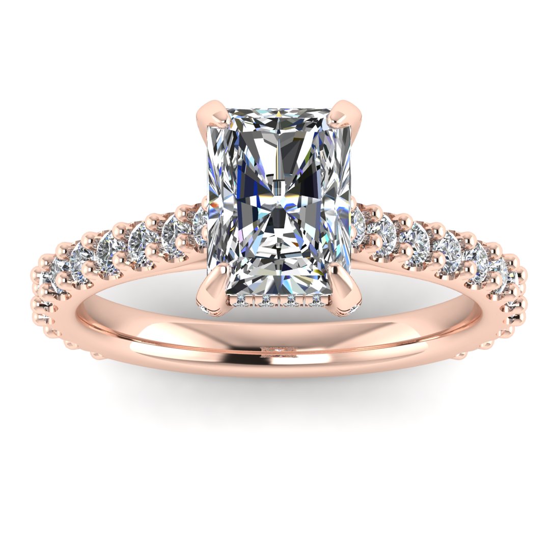 front view of Ellie rose gold engagement ring which has a central emerald cut lab grown diamond, elegant under-halo, pavé-set shoulders, and delicate diamonds on the prongs for extra sparkle