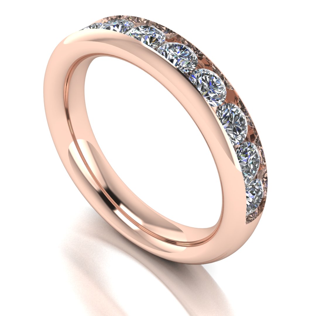angled view of a rose gold eternity ring or wedding band with round brilliant lab grown diamonds in a channel setting