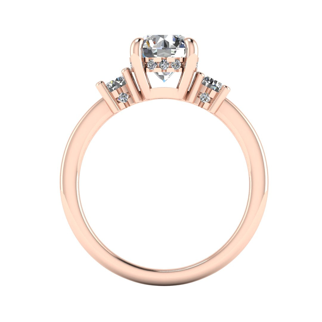 Flat view of rose gold trilogy engagement ring with three round brilliant lab grown diamond