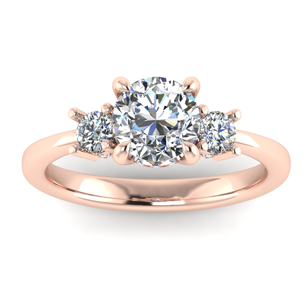 Front view of rose gold trilogy engagement ring with three round brilliant lab grown diamond