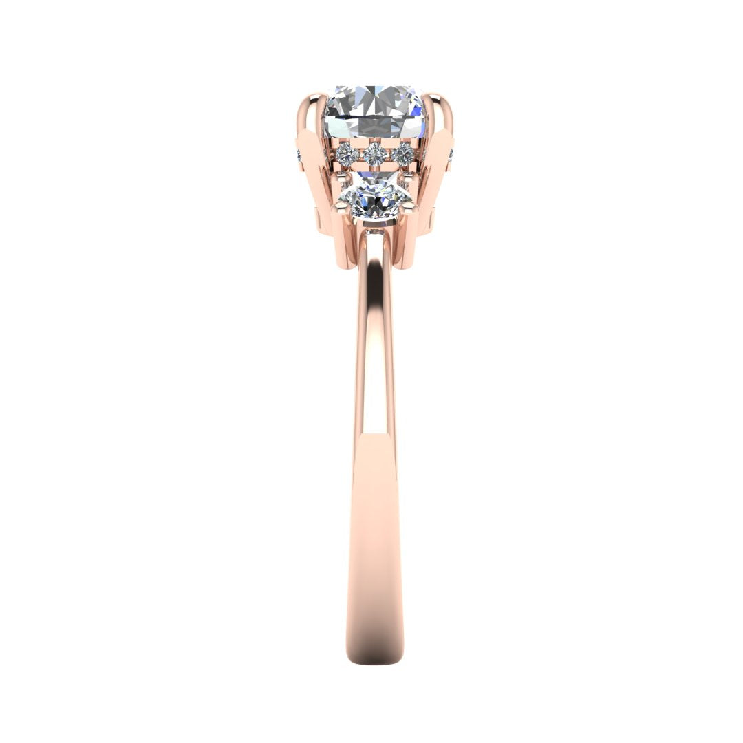 Side view of rose gold trilogy engagement ring with three round brilliant lab grown diamond