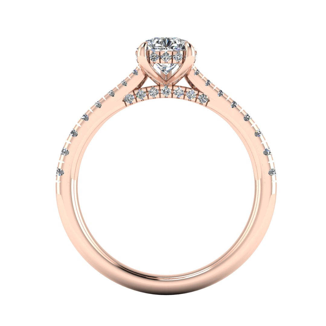 flat view of a rose gold engagement ring, there is a pear cut centre lab grown diamond which has a hidden under halo and pavé-set diamond shoulders