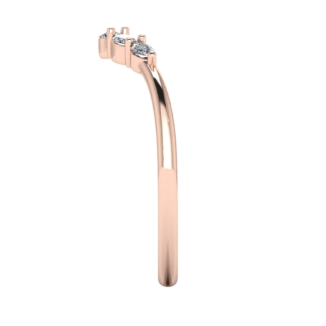 side view of a rose gold eternity ring or wedding band shaped with pear, oval & round lab grown diamonds