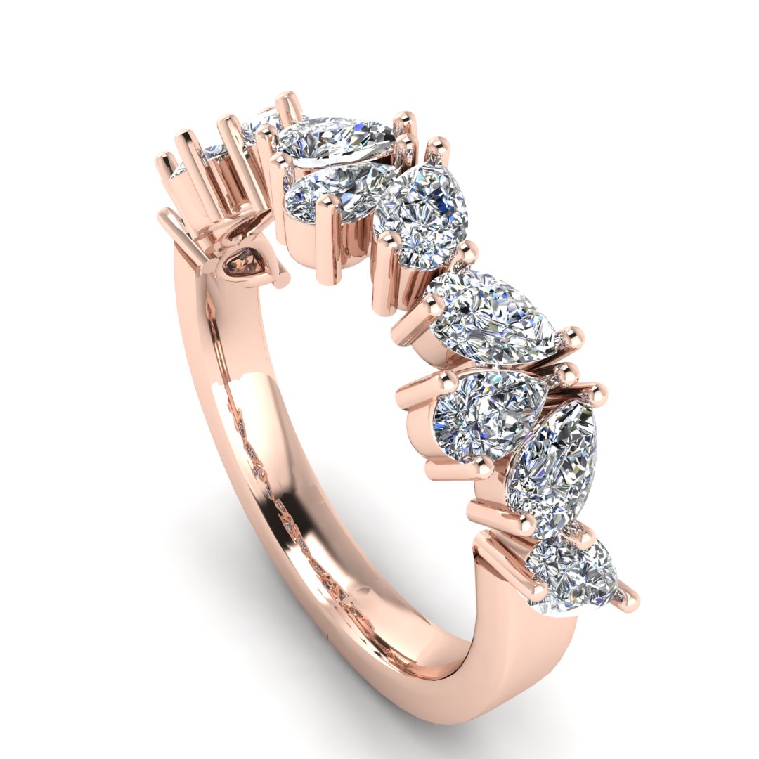 angled view off a glamourous intricate rose gold eternity ring which can also be worn as a wedding band featuring pear cut lab-grown diamonds arranged in a pattern