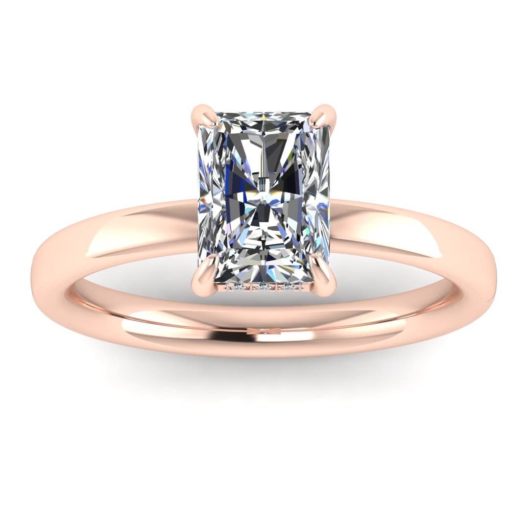 front view of a rose gold single solitaire engagement with set with a radiant cut lab grown diamond featuring a secret hidden under halo