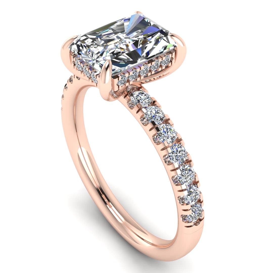 angled view of rose gold engagement ring featuring a radiant cut lab-grown diamond with pavé-set shoulders and a hidden halo