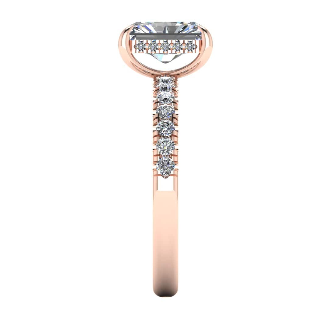 side view of rose gold engagement ring featuring a radiant cut lab-grown diamond with pavé-set shoulders and a hidden halo