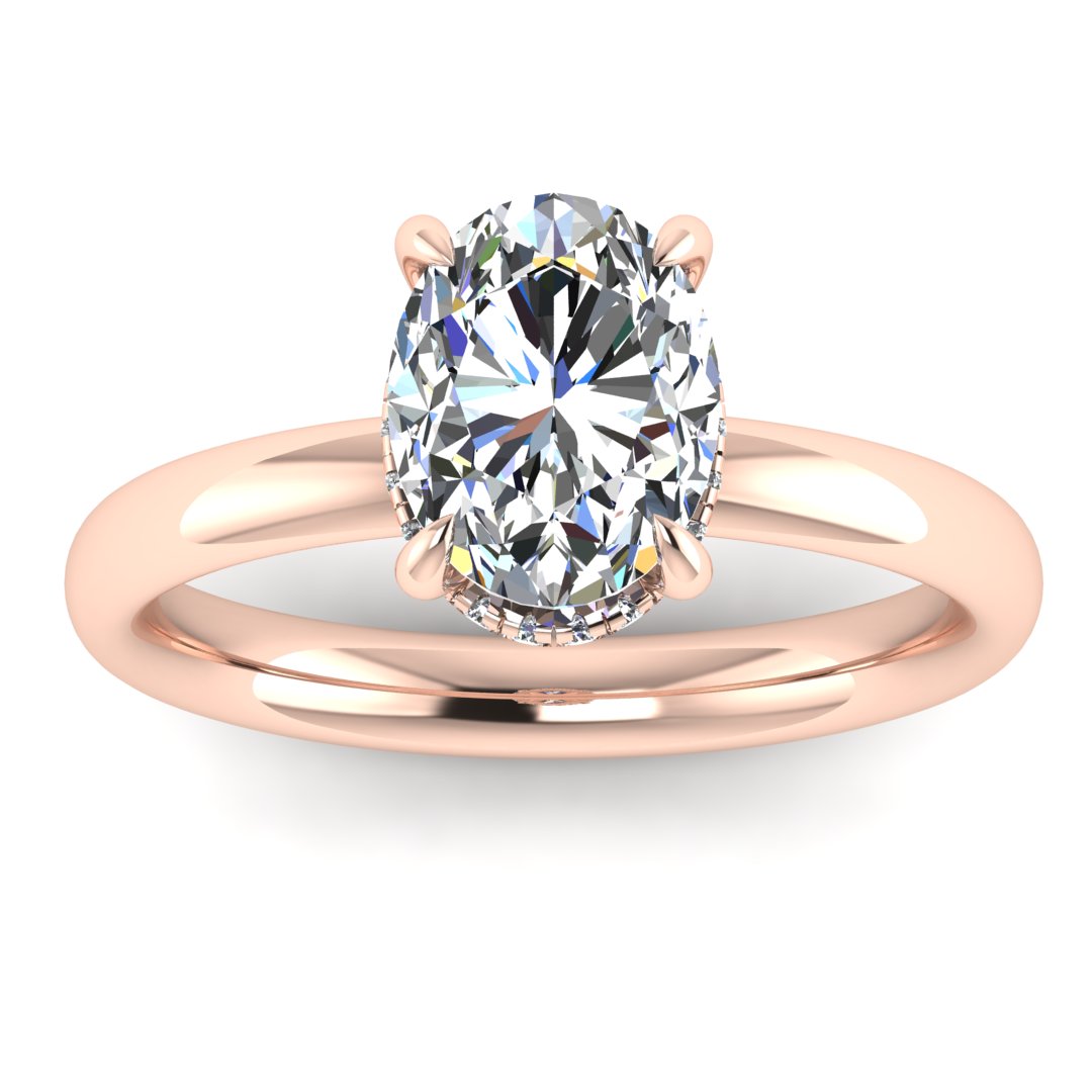 Front profile of a rose gold engagement ring with a oval cut lab grown diamond with a secret hidden halo