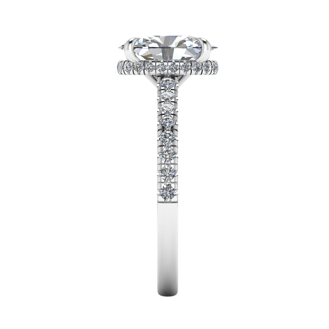 Side view of platinum and white gold oval cut lab grown diamond engagement ring with secret hidden halo and diamond band