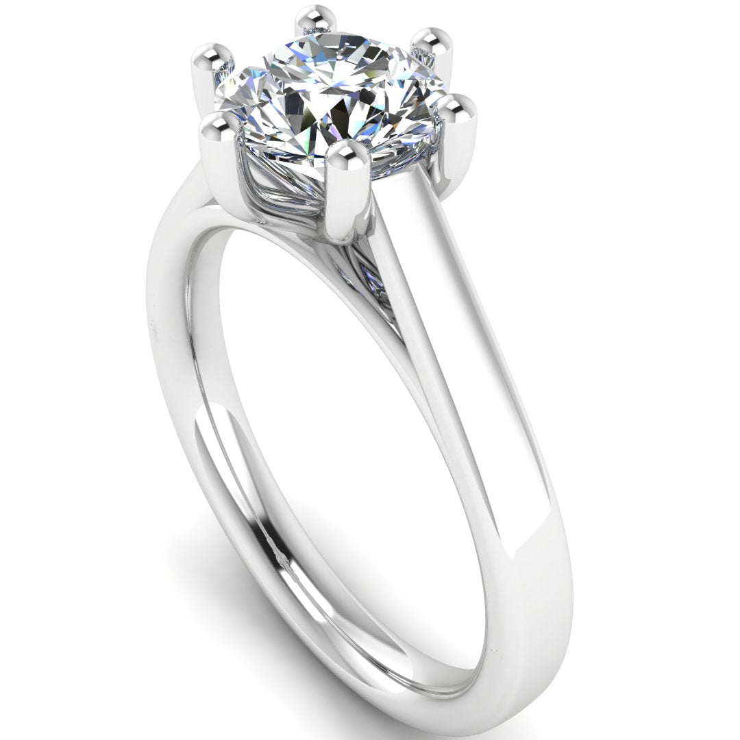 Angled view of Chelsea lab grown round brilliant engagement 6 claw ring in cathedral setting in white gold and platinum