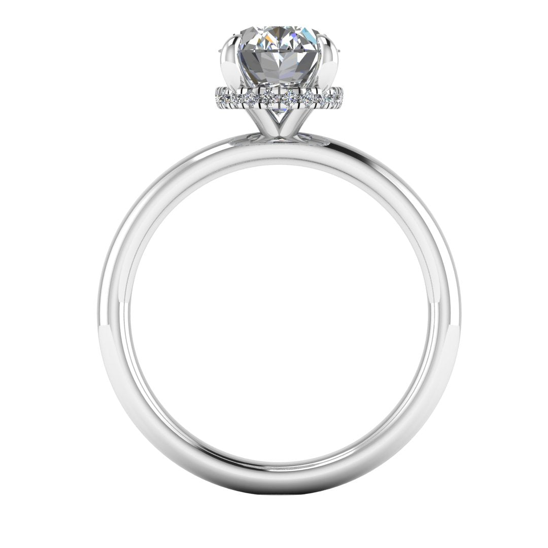 Flat profile of a white gold and platinum engagement ring with a oval cut lab grown diamond with a secret hidden halo