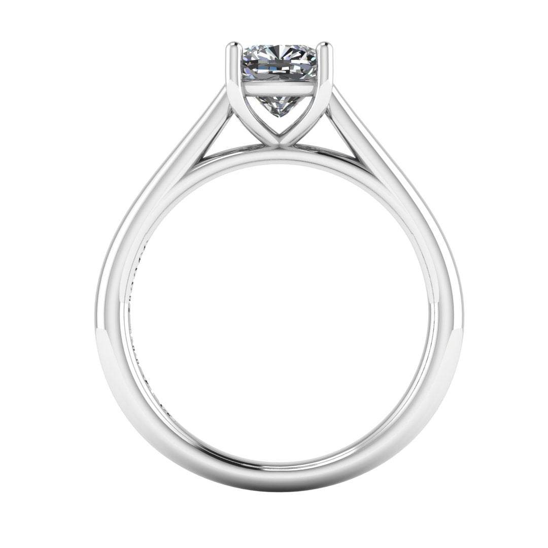 flat view of a platinum or white gold single solitaire engagement ring featuring a cushion cut lab grown diamond in a cathedral setting with 4 claws