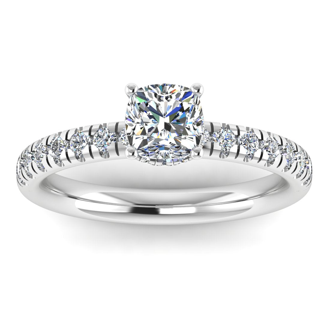 front view of a platinum or white gold cushion cut lab grown diamond engagement ring with pavé shoulders and a hidden halo