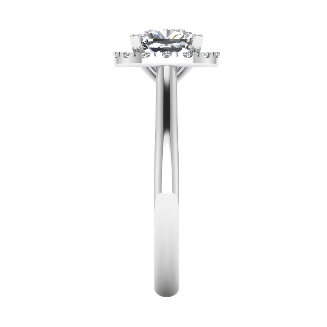 side view of a platinum or white gold cushion cut lab grown diamond engagement ring framed by a sparkling halo
