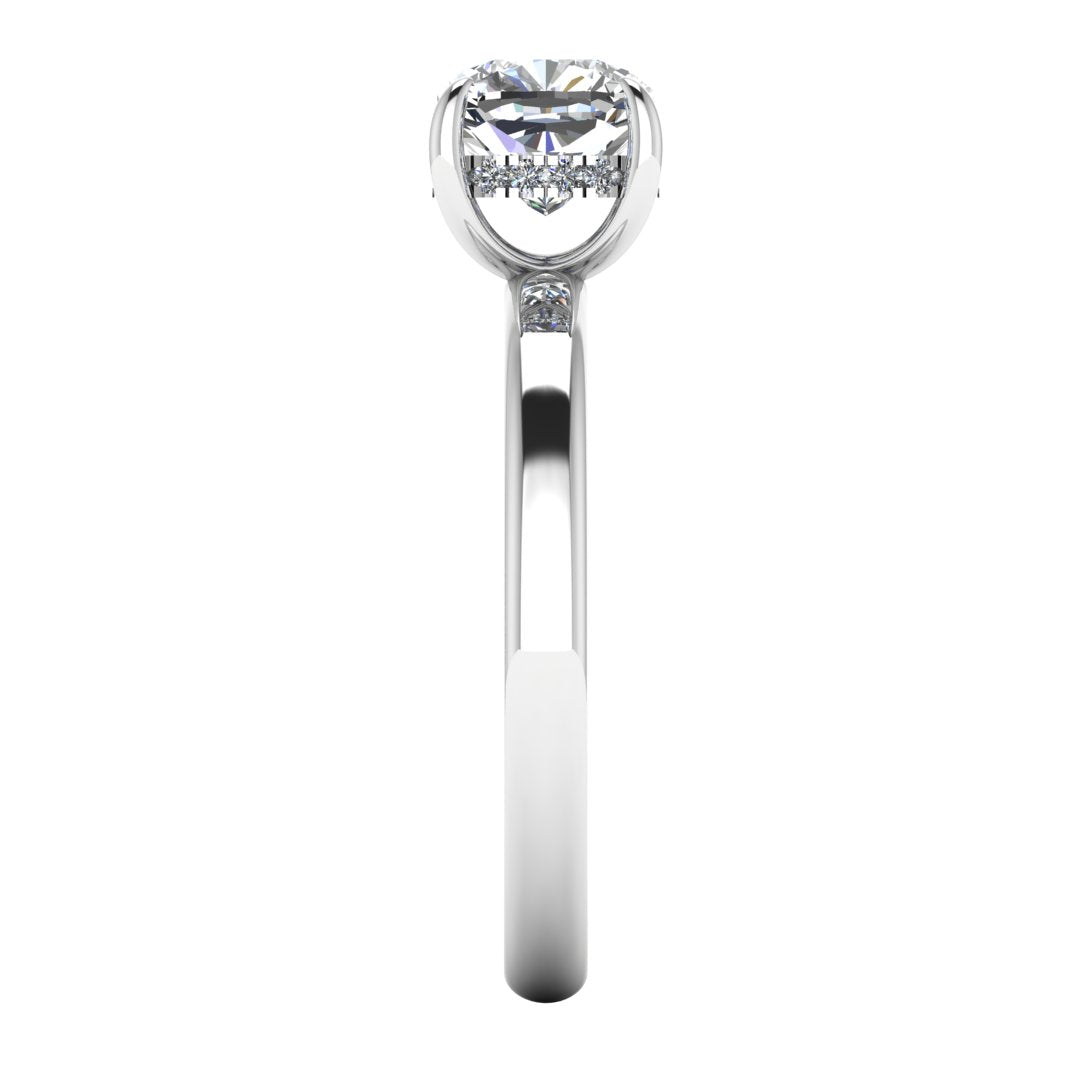 side view of a platinum or white gold engagement ring featuring a cushion cut lab grown diamond with a hidden halo in a solitaire design