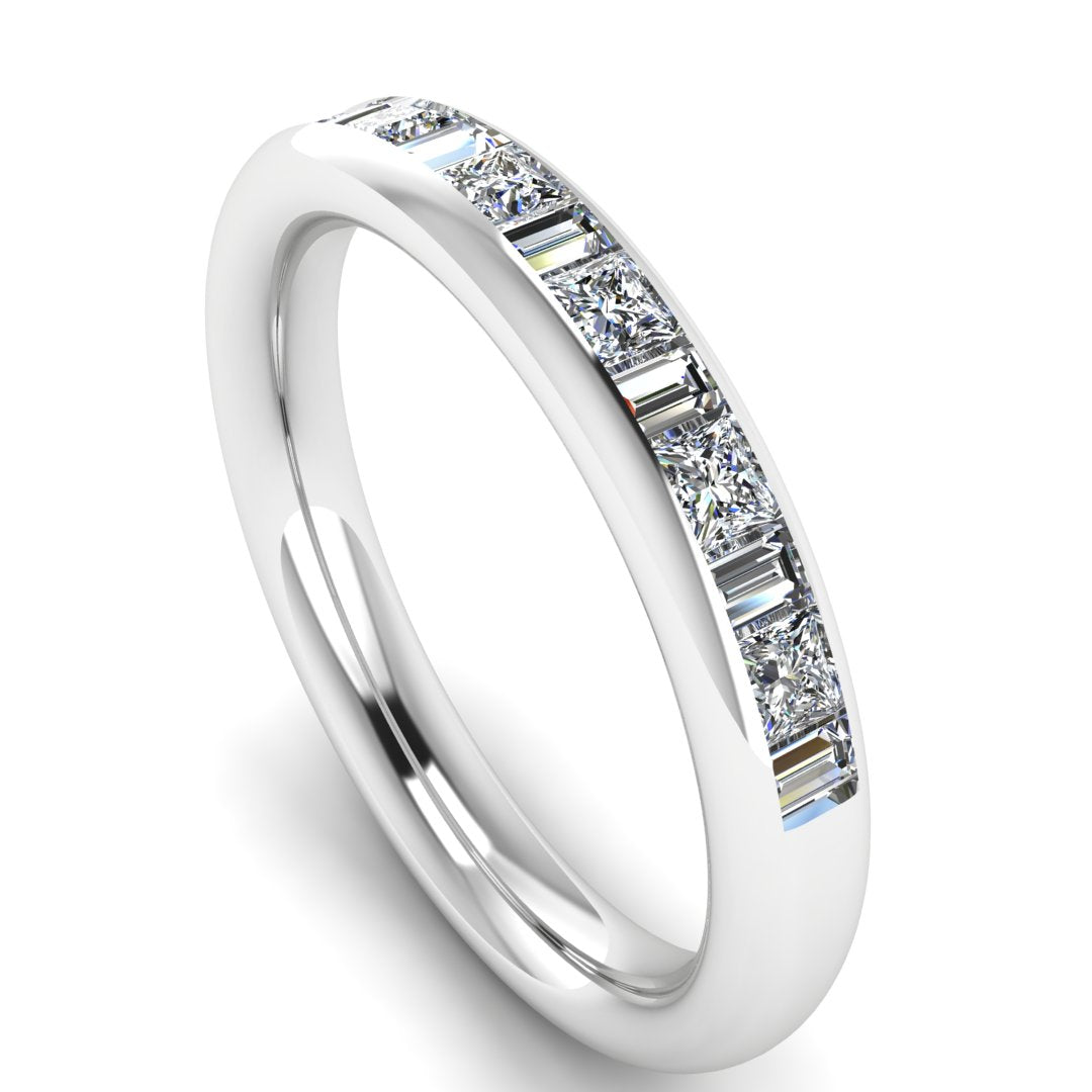angled view of a platinum or white gold wedding band with princess and baguette lab-grown diamond in a channel set design