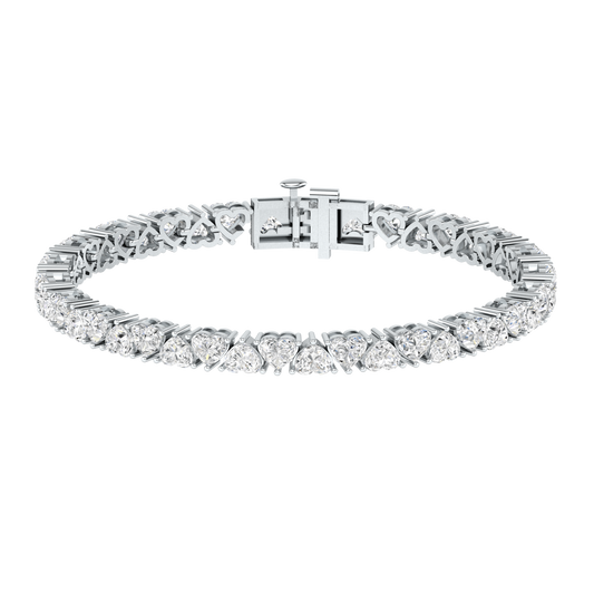 platinum or white gold tennis line bracelet with alternating heart shaped ethical & sustainable lab grown diamonds set using prongs
