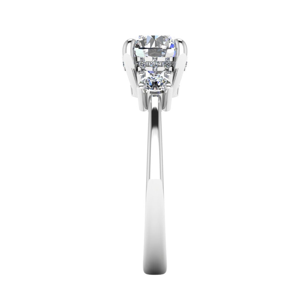 Side view of white gold and platinum trilogy engagement ring with three round brilliant lab grown diamond