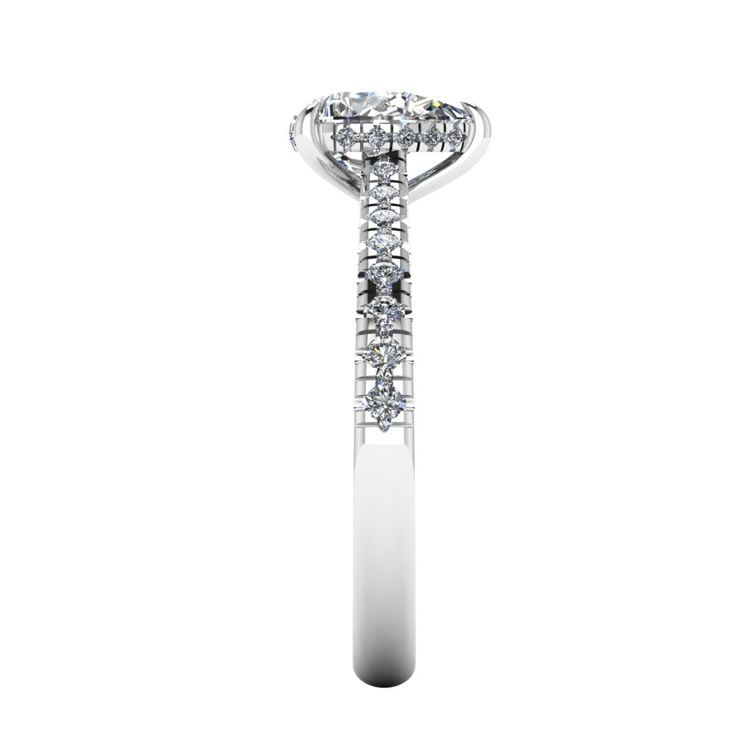side view of a platinum or white gold engagement ring, there is a pear cut centre lab grown diamond which has a hidden under halo and pavé-set diamond shoulders