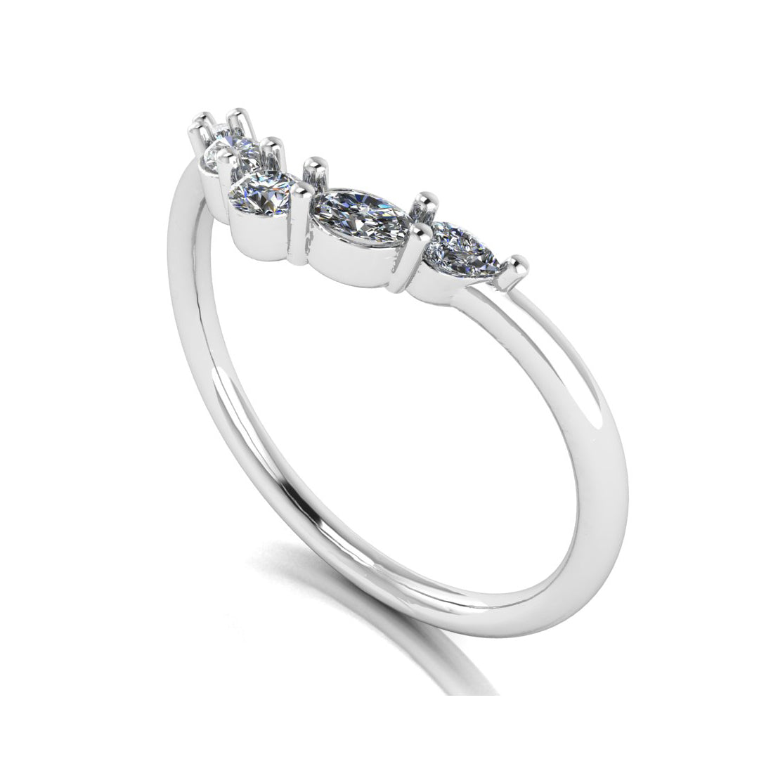 angled view of a platinum or white gold eternity ring or wedding band shaped with pear, oval & round lab grown diamonds