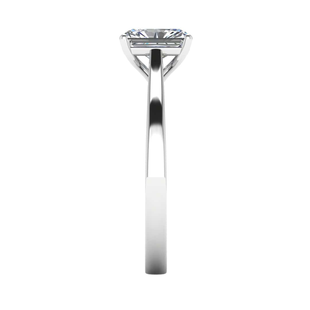 side view of a platinum or white gold engagement ring set with a radiant cut lab grown diamond with 4 claws