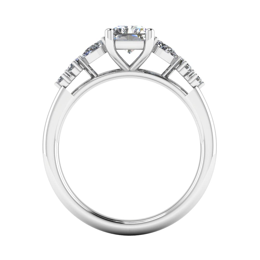 flat view of a platinum or white gold multi-stone lab grown diamond engagement ring. It features a radiant cut lab-grown diamond with one pear and two round side diamonds on either side