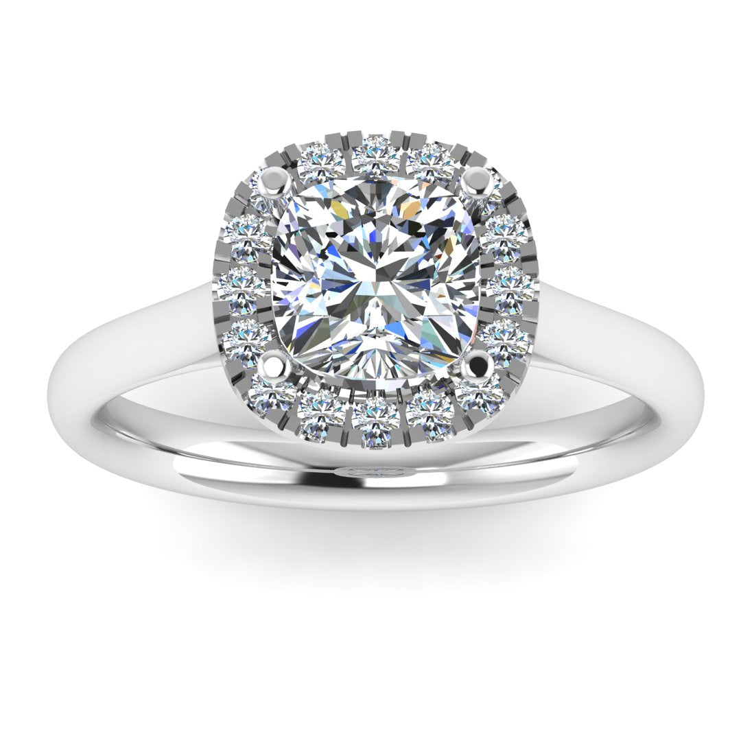 front view of a platinum or white gold cushion cut lab grown diamond engagement ring framed by a sparkling halo