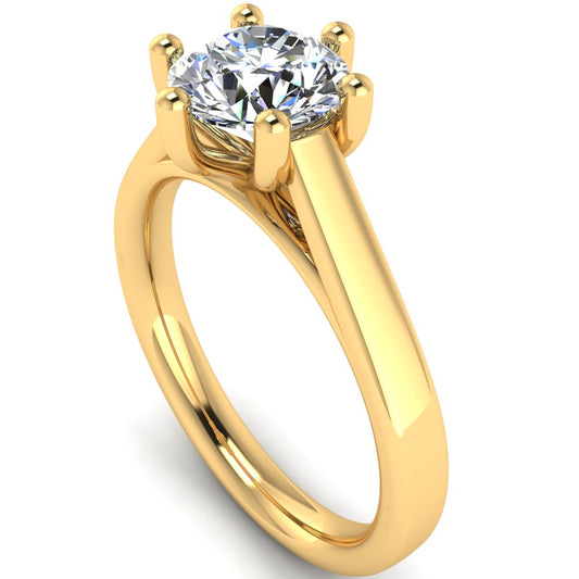 Angled view of Chelsea lab grown round brilliant engagement 6 claw ring in cathedral setting in yellow gold