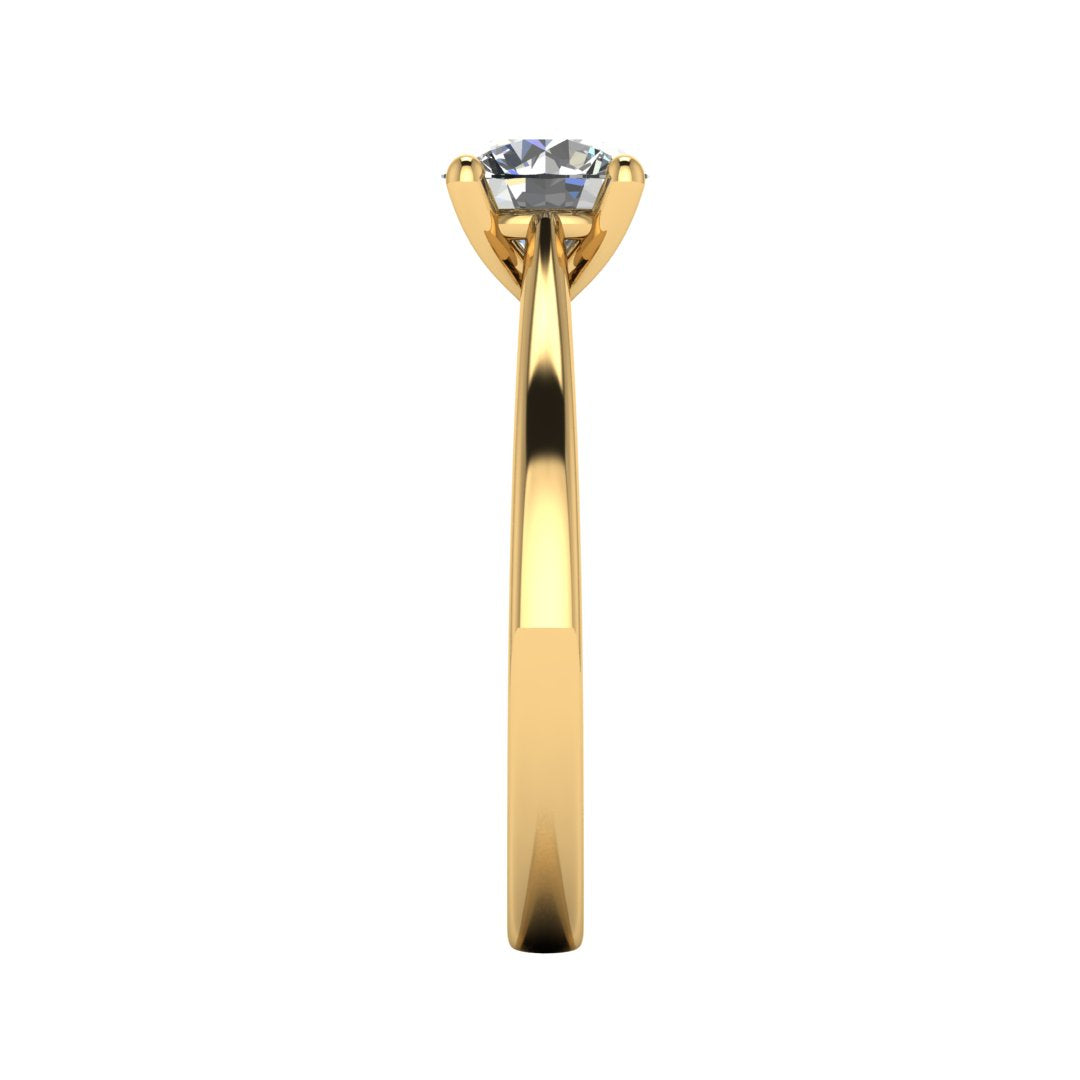 Side view of the Arya Engagement ring in yellow gold. A traditional single solitaire round brilliant lab grown diamond in a cathedral setting