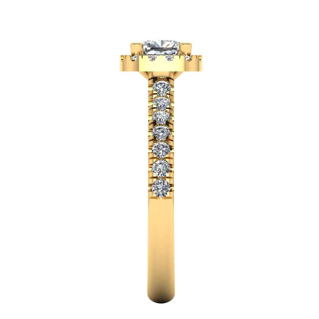 side view of a yellow gold engagement ring which features a cushion cut lab-grown diamond with a halo and pavé-set shoulders