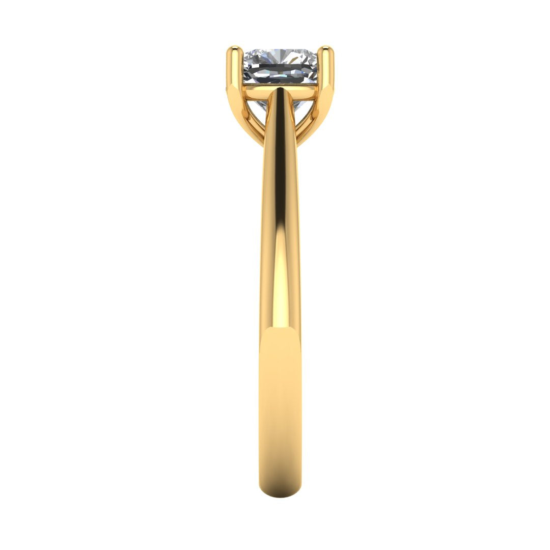 side view of a yellow gold single solitaire engagement ring featuring a cushion cut lab grown diamond in a cathedral setting with 4 claws