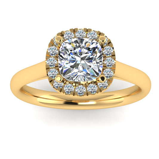 front view of a yellow gold cushion cut lab grown diamond engagement ring framed by a sparkling halo