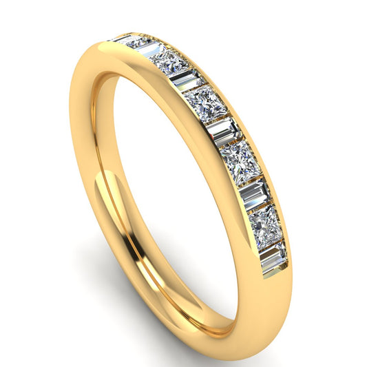 angled view of a yellow gold wedding band with princess and baguette lab-grown diamond in a channel set design