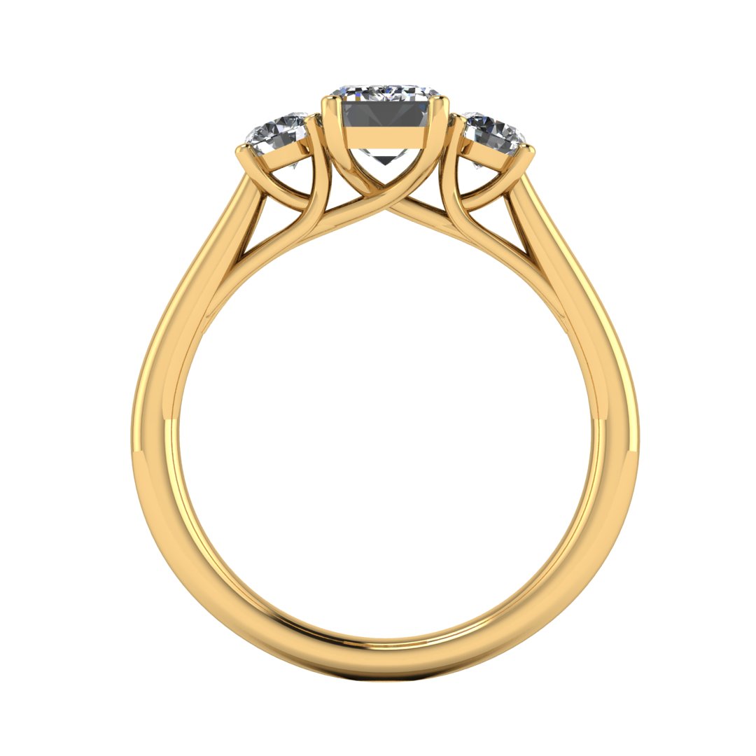 flat view of a trilogy yellow gold engagement ring set with an emerald centre lab grown diamond with two round brilliant diamonds on either side of the centre stone