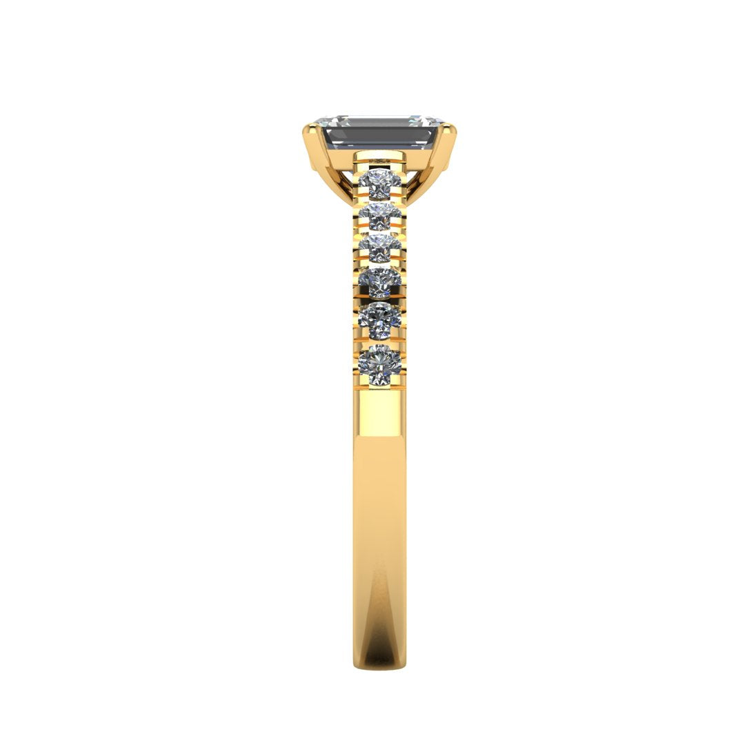 side view of a yellow gold engagement ring with an emerald cut lab-grown diamond as the centre stone with pavé-set diamond shoulders