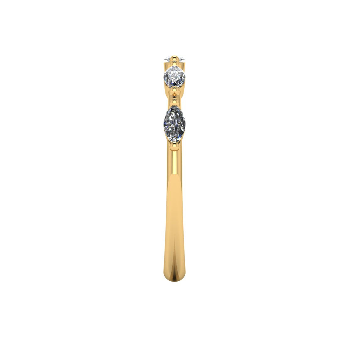 side view of a yellow gold station set wedding band with marquise lab grown diamonds