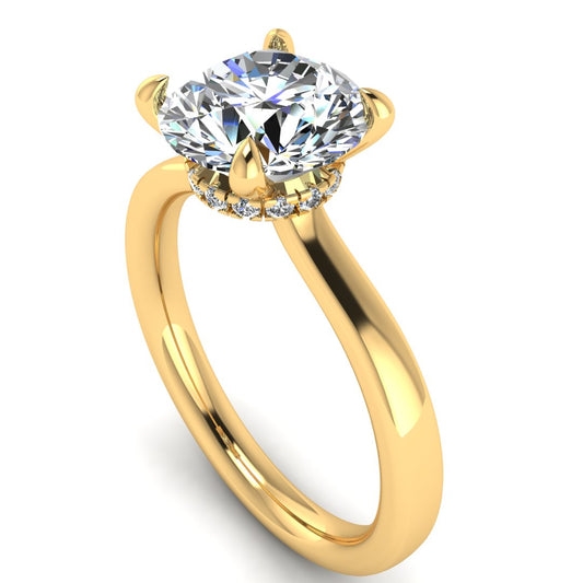 Angled view of Helan round brilliant engagement ring with a secret hidden halo in yellow gold