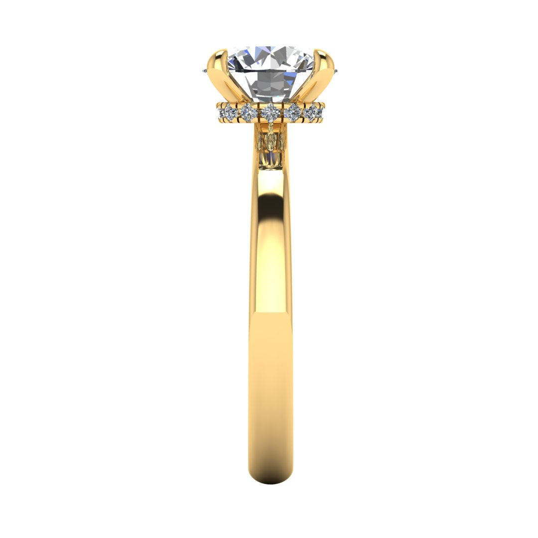 Side view of Helan round brilliant engagement ring with a secret hidden halo in yellow gold
