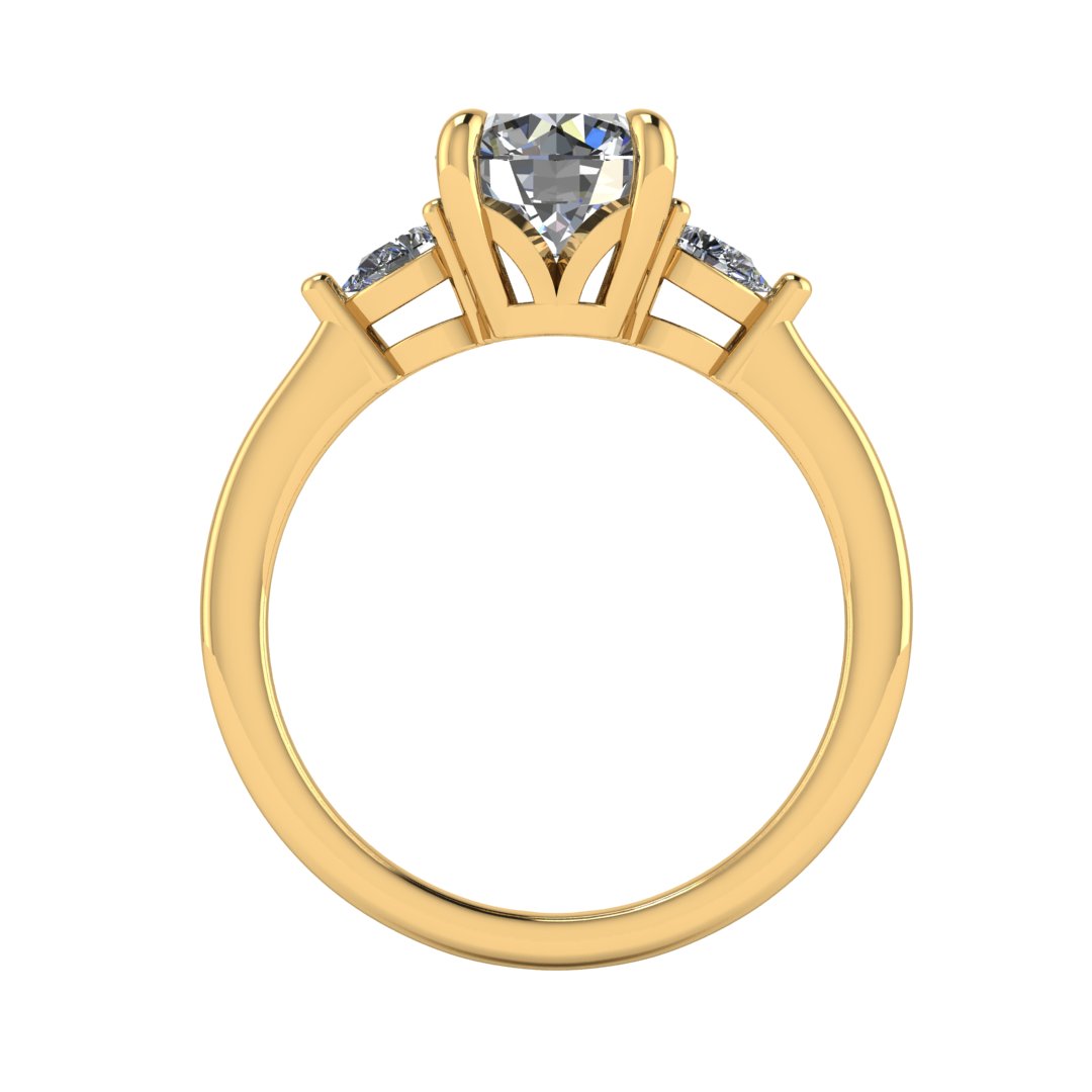 Flat view of a yellow gold trilogy engagement ring using round and pear shaped lab grown diamonds